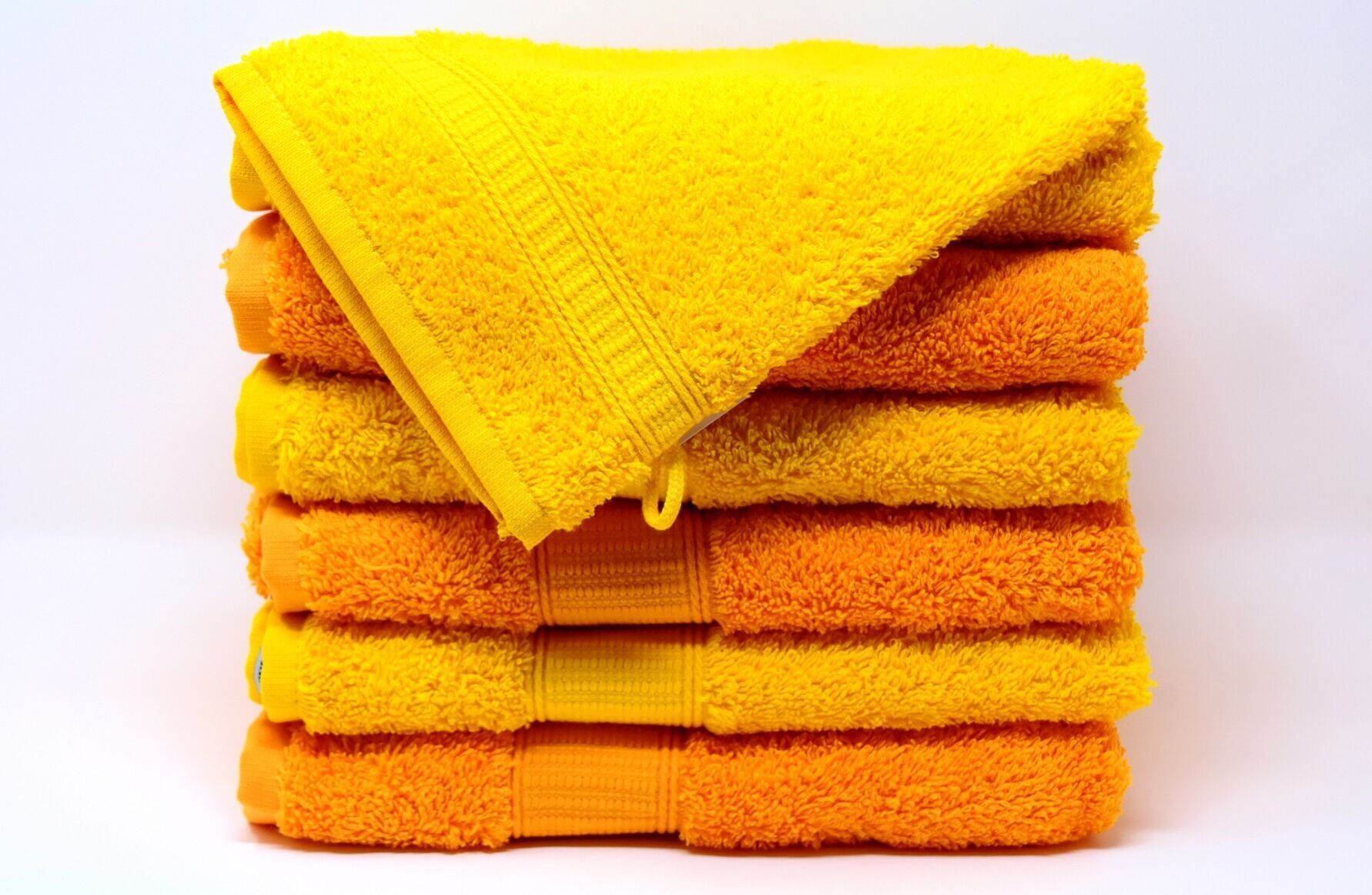 Worn bath mats and towels